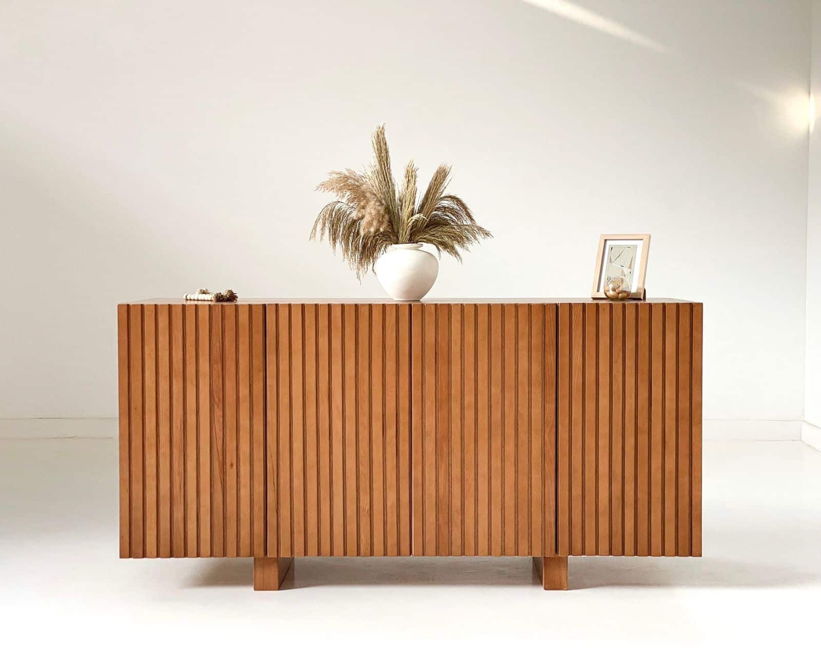 Slatted Buffet, a stylish and versatile addition to your dining area or living space. Crafted with premium materials and attention to detail, this buffet combines modern design with practical functionality to enhance your home decor